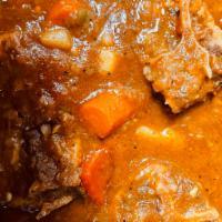Oxtails  · Beef Oxtails serve with your choice of rice and plantains  ; Jollof rice or rice and beans 