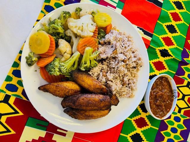 Vegan Plate  · served with  steam mixed vegetables, rice and beans, plantains and spicy  home made MaShallah sauce 