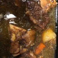 Lamb and Cow feet soup  · well slow  cooked and season lamb and cow feet/leg, cooked with carrots and potatoes 