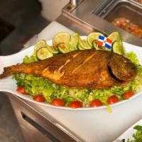 Chillo Boca Chica · Fresh fried red snapper, tostones, green salad