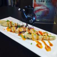C5. Jalapeno Poppers · Jalapeno stuffed with spicy tuna and cream cheese with special sauce. Spicy.