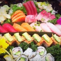 E10. Love Boat · 18 pieces sashimi, 8 pieces nigiri, 1 Bang-Bang roll and 1 California roll.