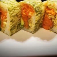 R30. Tiger Roll · Spicy tuna, tempura flakes, avocado, and cucumber wrapped with iso seaweed and special sauce...