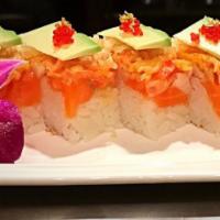 R43. Bang Bang Press Roll · Tuna, salmon, yellowtail topped with spicy kani, tempura flakes, avocado and tobiko. Spicy. ...