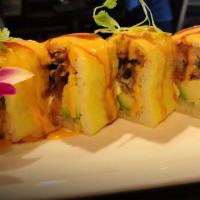R44. Wild Caribbean Roll · Tempura oyster, smoked salmon, cream cheese, avocado wrapped with soy bean paper and special...