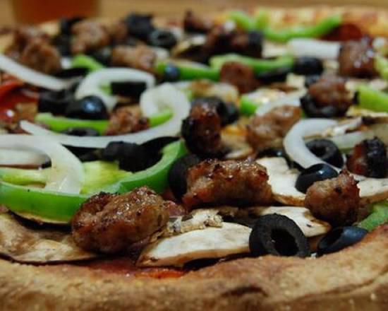 The Works Pizza · Canadian bacon, pepperoni, salami, Italian sausage, onions, mushrooms, bell peppers, and black olives.