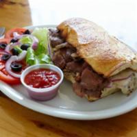 Steak and Mushrooms Sandwich · Steak, mushrooms, red onions, and mozzarella. With French roll.