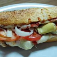 Vegetarian Sandwich · Fresh mushrooms, artichoke hearts, sliced tomatoes, onions, and mozzarella. With French roll.