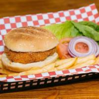 Crispy Chicken Sandwich · Served with fries, mayo, lettuce, tomatoes, pickles.