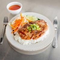 26. Grilled Pork Chop on Steamed Rice Plate · 