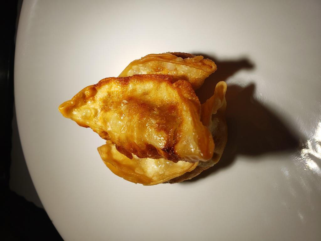 3 Potstickers · Crescent shaped dumpling. 