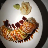 Rock and Roll · Fried crab stick with spicy mayo shrimp and avocado with eel sauce outside.