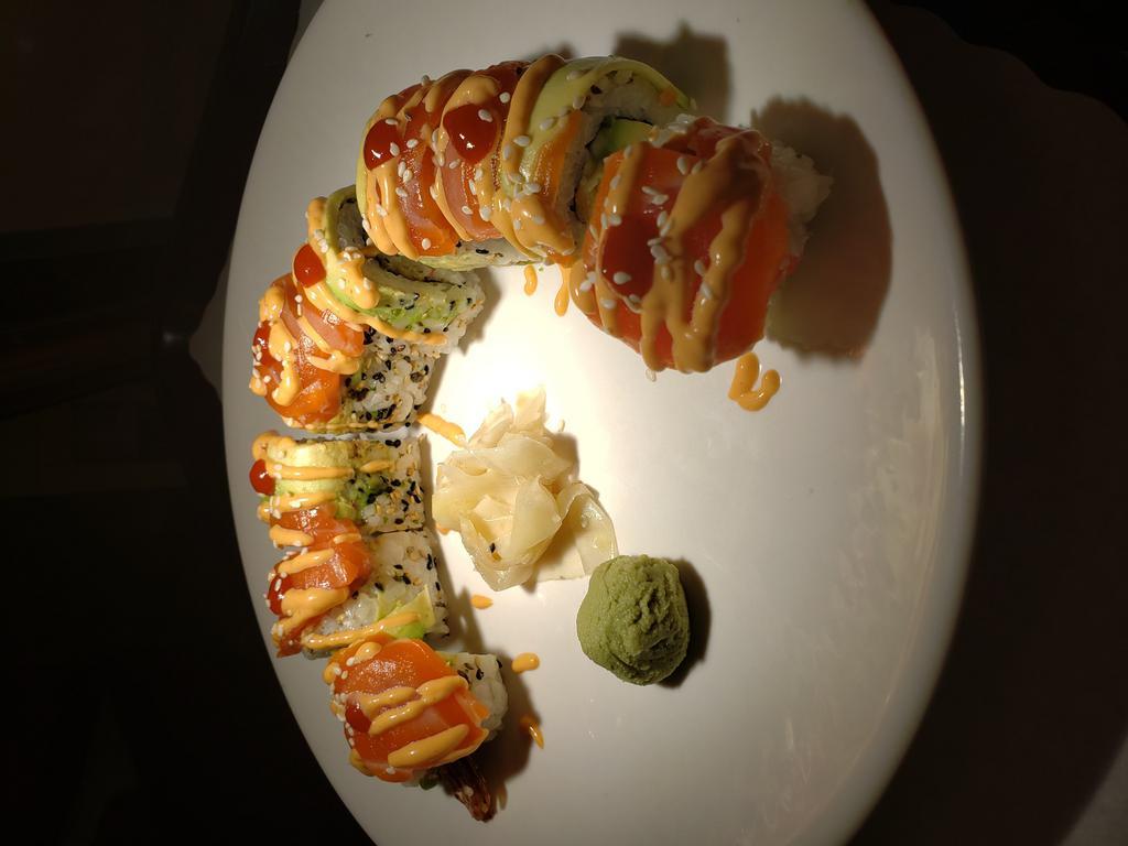 House Roll · Crab, avocado, cucumber, tempura shrimp, salmon and avocado with spicy mayo with sriracha.