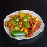 Loaded Fries · Our awesome fries topped with melted cheese, bacon, & jalapeños.