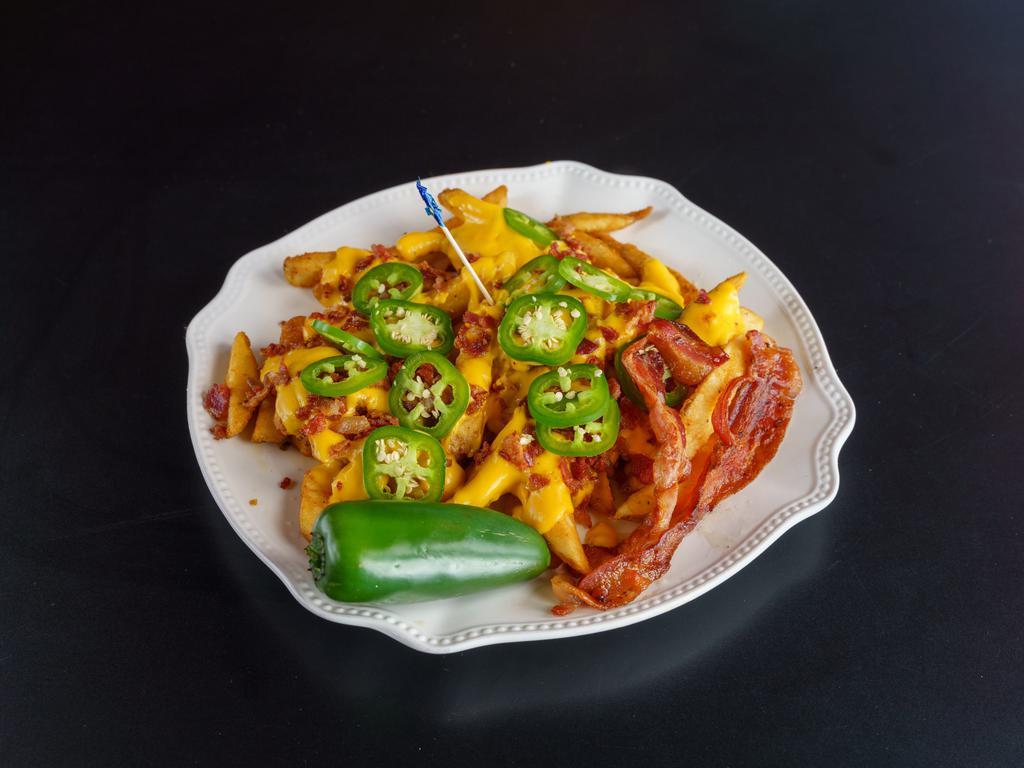 Loaded Fries · Our awesome fries topped with melted cheese, bacon, & jalapeños.