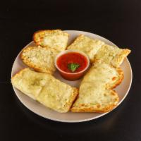 Garlic Bread with Cheese · Delicious garlic spread with melted cheese over toasted bread and marinara sauce for dipping.