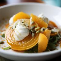 Golden Beet Salad · Arugula, oranges, pepitas, green onions, whipped honey goat cheese, and white balsamic reduc...
