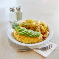 House Omelette · Mushrooms, tomatoes, onions, bell peppers, cheddar cheese and avocado.