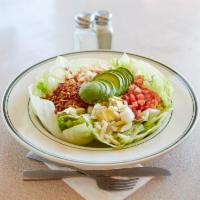 Cobb Salad · Turkey breast, tomato, bacon, fresh avocado and a hard-boiled egg. Served on a bed of iceber...