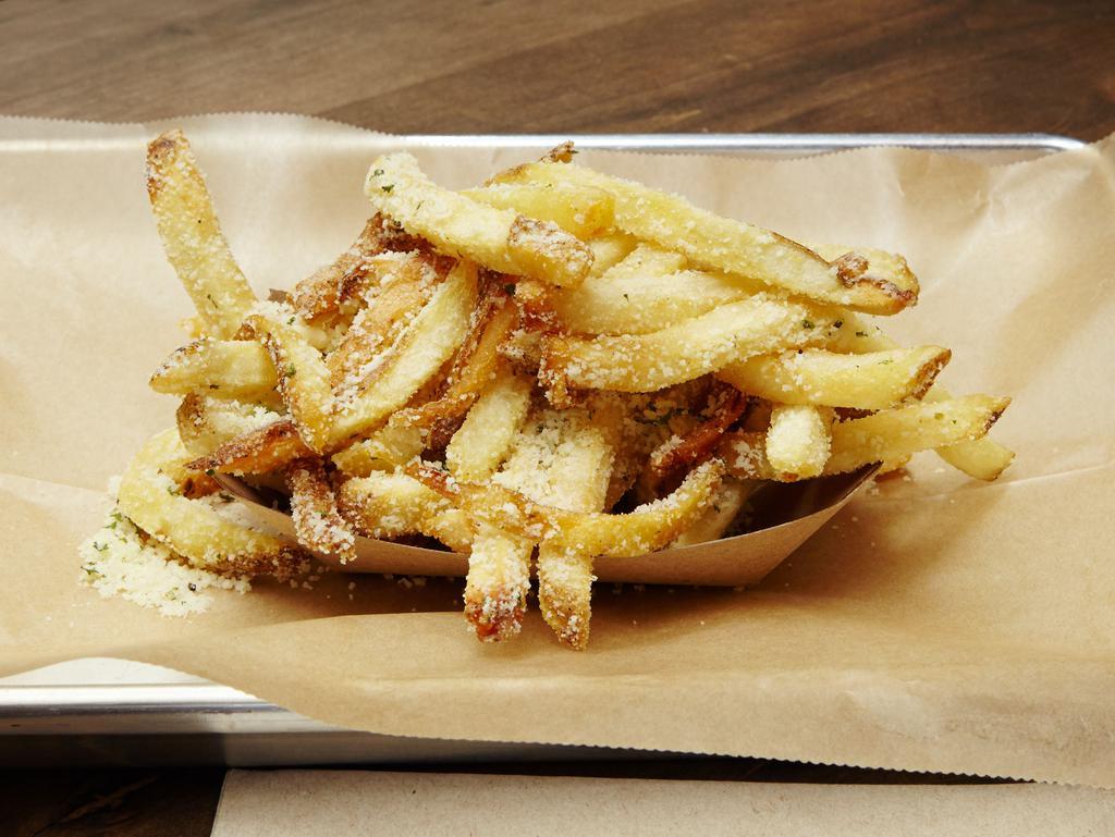 Truffle Fries · Hand cut, tossed in truffle salt, parsley and parmesan cheese.
