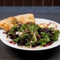 Four Seasons Salad · Field greens, sliced apples, candied walnuts, dried cranberries and goat cheese, topped with...
