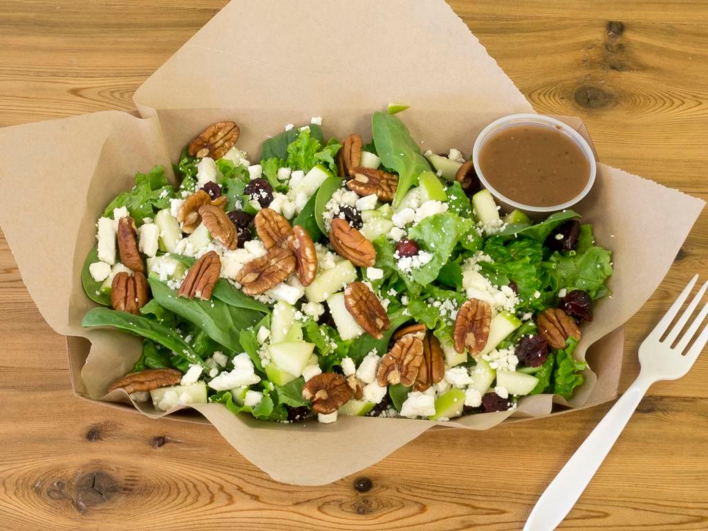 Cranberry Pecan Salad · Mixed baby greens, cranberries, pecans, green apple and feta cheese served with balsamic vinaigrette.