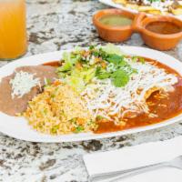 Enchilada Combo · 3 enchiladas, cheese or chicken, red or green salsa rice and beans.