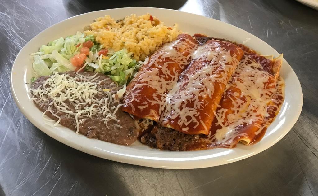 3 Enchilada Dinner · Served enchilada style with 1 beef enchilada, 1 chicken enchilada and 1 cheese enchilada. Served with your choice of two sides.  Some sides may result in an up-charge.