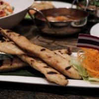 Chicken Satay  · 4 skewers. Grilled marinated chicken on skewers. Served with peanut sauce and cucumber sauce.