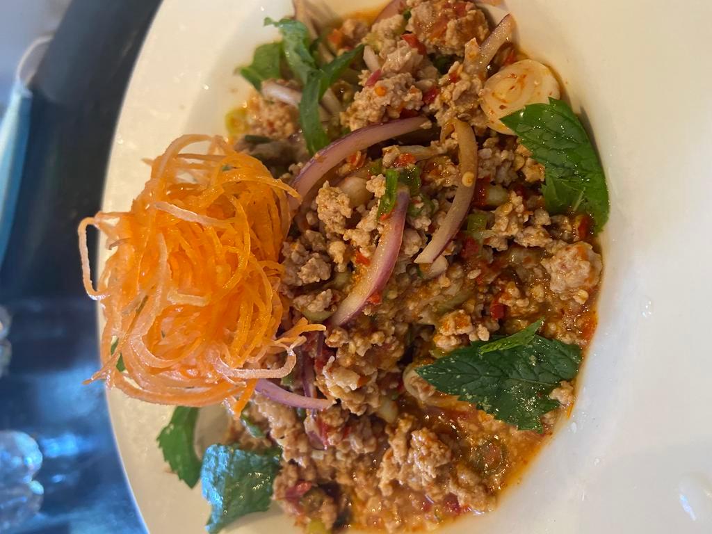 Chicken Larb  · Thai eastern style salad with ground chicken, red onions,scallions, mint leaves and chili lime dressing.