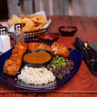 Chile Rellenos · 2 large roasted Anaheim peppers, Jack cheese, beer battered and fried. Served with cilantro ...