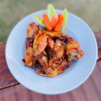 Bone-in wings · 6 or 12 bone-in wings tossed in our homemade rubs and sauces.