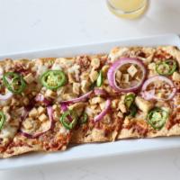 BBQ Chicken Flatbread · House made BBQ sauce, cheese blend, sweet BBQ dry rub chicken, red onion and jalapeno.
