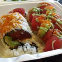 Shark's Roll · In: salmon, tuna, hamachi and avocado. Out: tobiko around.