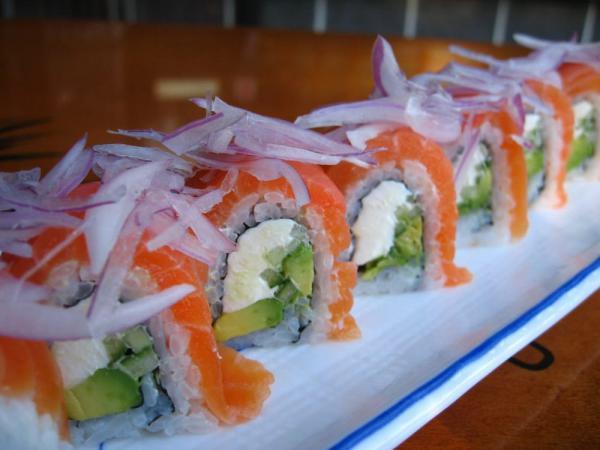 Alaska Philly Roll · In: cream cheese, cucumber and avocado. Out: smoked salmon, red onion, caper and wasabi sauce.