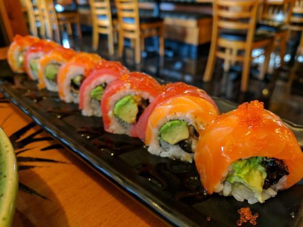 Pink Dragon Roll · In: unagi and avocado. Out: salmon, tuna, fish roe, tobiko and sweet sauce.
