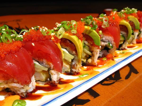Soju Roll · In: deep-fried shrimp cream cheese, cucumber and spicy tuna. Out: tuna, avocado, tobiko and sweet sauce. Spicy.