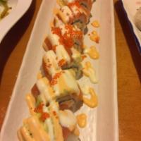 Sushi Boy Roll · In: spicy real crab and cucumber. Out: salmon, avocado, tobiko and spicy mayo sauce. Spicy.
