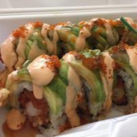 Jane's Roll · In: shrimp tempura and spicy tuna. Out: avocado layered on top with tobiko. Spicy.