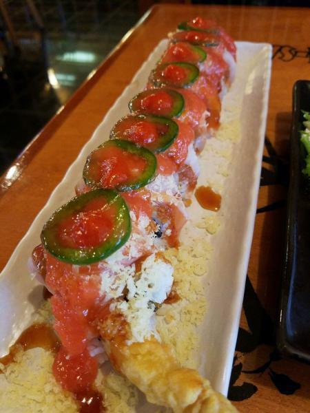 Blood Mango Roll · In: unagi, spicy tuna and shrimp tempura. Out: hamachi, sake, jalapeno, crispy crunch and mango sauce.