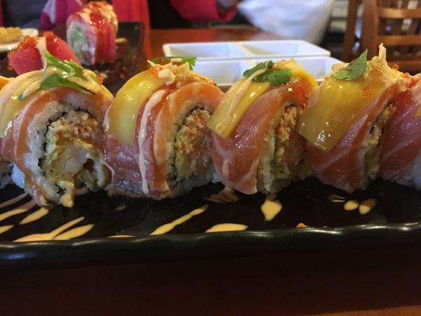 Owen Special Roll · In: unagi, hamachi and avocado. Out: spicy tuna, hamachi, salmon, jalapeno tobiko with sweet and spicy sauce.