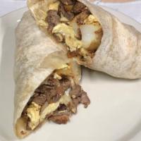 Breakfast Burrito · Flour tortilla rolled with your choice of chorizo, steak, or ham with potatoes, beans, eggs,...