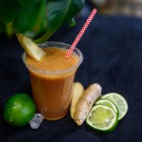 The Oasis Ginger Bomb Juice · Fresh squeezed ginger root, organic apple juice, and a dash of aid digesting cayenne. Vegan.