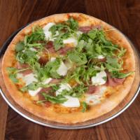 Bianca Pizza · Fresh mozzarella, prosciutto di Parma, fresh arugula, Wisconsin mozzarella and Sicilian extr...