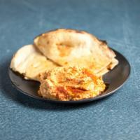 Hummus and Nan · Homemade spiced hummus served with plain nan. 