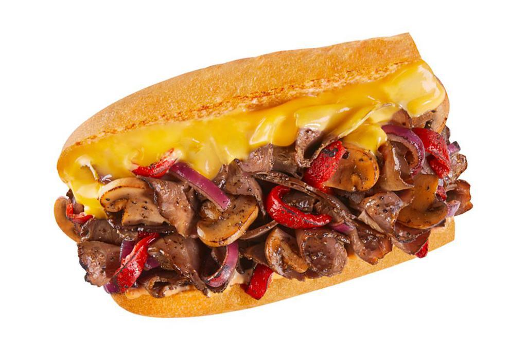 #35 Cheese Steak Melt · Over a 1/4 pound of warm, tender steak or all-natural, rotisserie-style chicken combined with sautéed mushrooms, roasted red peppers, and sliced onions covered with gooey, melty American cheese and just enough chipotle mayo to kick up the flavor.