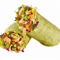 Asian Chicken Wrap · Shredded lettuce, carrots, cabbage, green onions, and cilantro with wonton strips, sesame se...