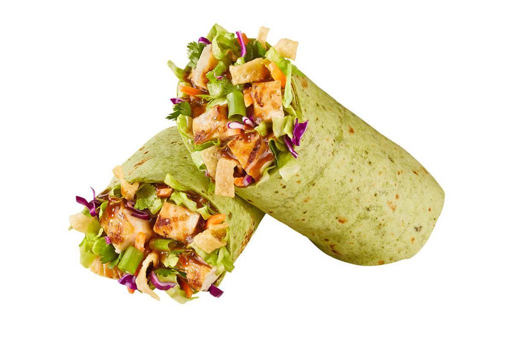 Asian Chicken Wrap · Chicken, shredded lettuce, carrots, cabbage, green onions & cilantro with wonton strips, sesame seeds and Asian dressing, wrapped in a spinach tortilla