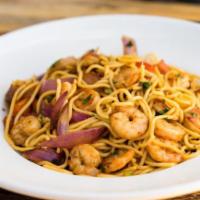 Tallarin de Camarones · Spaghetti served with stir fried shrimp, onions, tomatoes, cilantro and soy sauce.