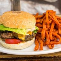 Hambuergueson · A classic homemade Peruvian burger made with Certified Angus Beef, with cheddar cheese, lett...